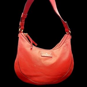 Red Kate Spade handbag.